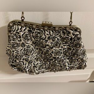 Elegant Black and Cream Floral Clutch